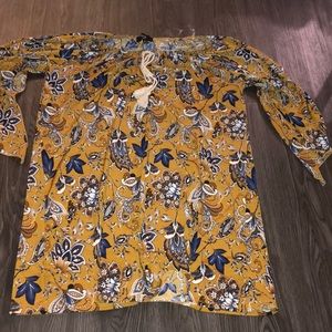 Off the shoulder, boho style dress.